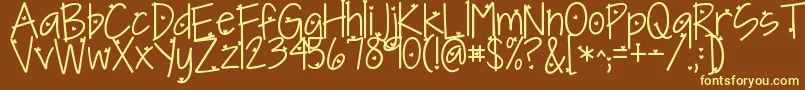 Kgineedaheartfont-fontti – keltaiset fontit ruskealla taustalla