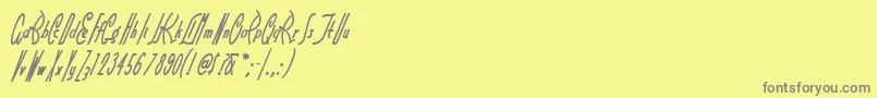 フォントLittlerickeynf – 黄色の背景に灰色の文字
