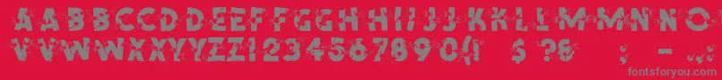 ShrapnelRegular-Schriftart – Graue Schriften auf rotem Hintergrund