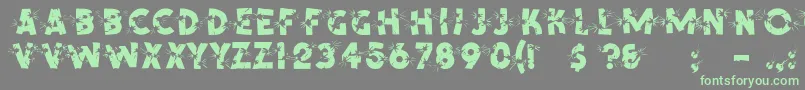 フォントShrapnelRegular – 灰色の背景に緑のフォント