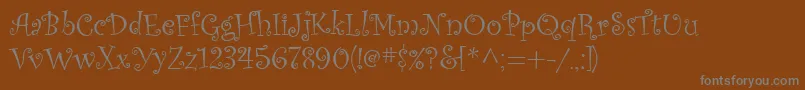 CurlzMt Font – Gray Fonts on Brown Background