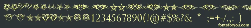 HeartsAndStars Font – Yellow Fonts on Black Background