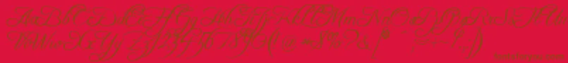FreebooterScript-Schriftart – Braune Schriften auf rotem Hintergrund