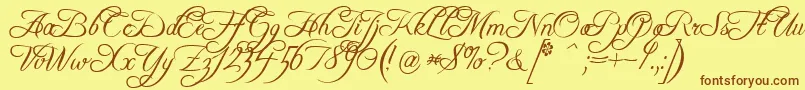 FreebooterScript-fontti – ruskeat fontit keltaisella taustalla