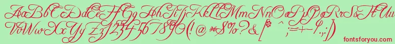 FreebooterScript-Schriftart – Rote Schriften auf grünem Hintergrund