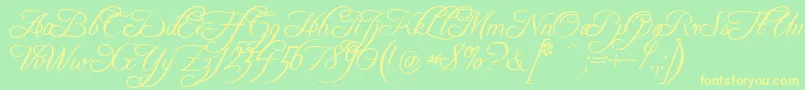 FreebooterScript-Schriftart – Gelbe Schriften auf grünem Hintergrund