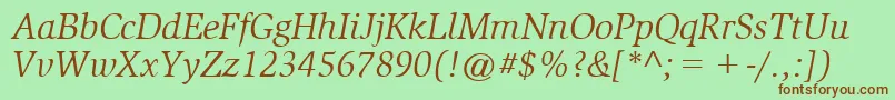 Fonte SlimbachBookitalic – fontes marrons em um fundo verde