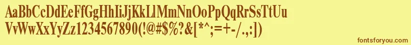 フォントTimeset65b – 茶色の文字が黄色の背景にあります。