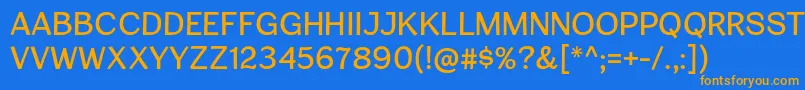 フォントCardiganTitlingRg – オレンジ色の文字が青い背景にあります。