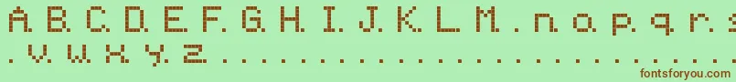 Ninepin-fontti – ruskeat fontit vihreällä taustalla