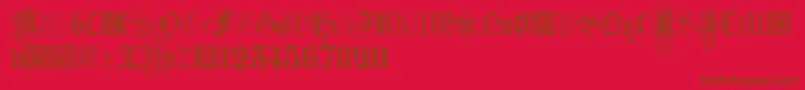 フォントKidnappedAtGermanLandsFour – 赤い背景に茶色の文字