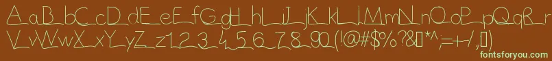 フォントVague – 緑色の文字が茶色の背景にあります。