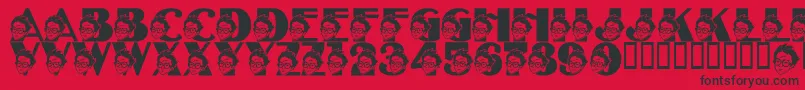 LmsTheSorcerersFont-Schriftart – Schwarze Schriften auf rotem Hintergrund