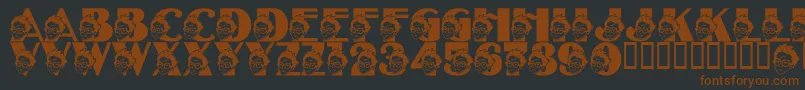 Czcionka LmsTheSorcerersFont – brązowe czcionki na czarnym tle