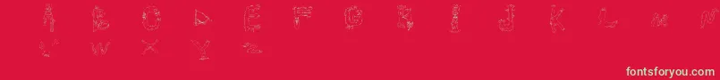 Monstros-Schriftart – Grüne Schriften auf rotem Hintergrund