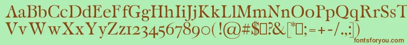 More about CaritaRegular Font CaritaRegular Font – Brown Fonts on Green Background