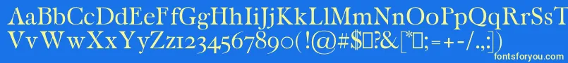 CaritaRegular Font – Yellow Fonts on Blue Background