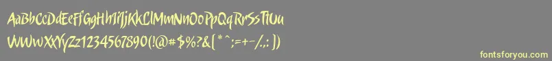 Candombe Font – Yellow Fonts on Gray Background
