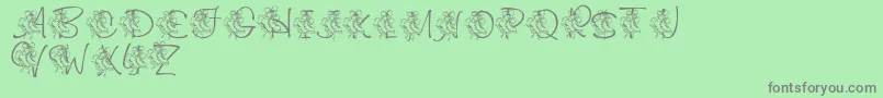 Weitere Informationen zur LmsCuttingTheIce-Schriftart LmsCuttingTheIce-Schriftart – Graue Schriften auf grünem Hintergrund