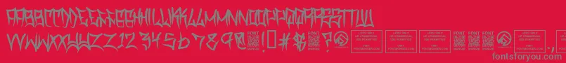 フォントTraviscountyRegular – 赤い背景に灰色の文字