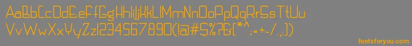 フォントTechnoLcd – オレンジの文字は灰色の背景にあります。