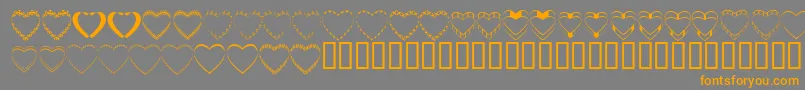 Czcionka 4yeohearts – pomarańczowe czcionki na szarym tle