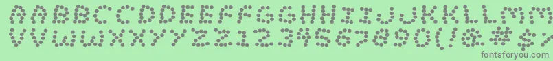 LostMarbles Font – Gray Fonts on Green Background