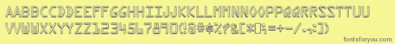 フォントKreditRegular – 黄色の背景に灰色の文字