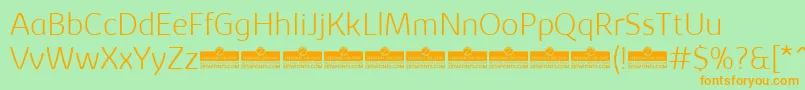 KabrioExtralightTrial Font – Orange Fonts on Green Background