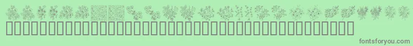 KrFloralColorMe-fontti – harmaat kirjasimet vihreällä taustalla