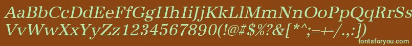 フォントAntiquastdItalic – 緑色の文字が茶色の背景にあります。