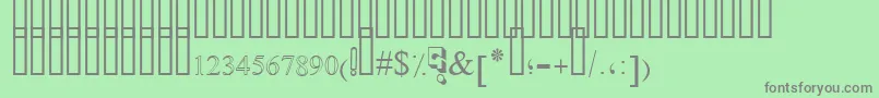 フォントSimpleIndustShaded – 緑の背景に灰色の文字