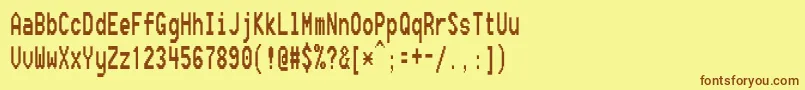 Шрифт Fixsysc – коричневые шрифты на жёлтом фоне