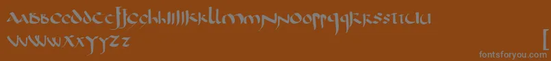 CorbeiUncial-Schriftart – Graue Schriften auf braunem Hintergrund