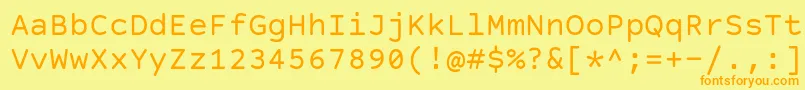 Czcionka CourierPrimeCode – pomarańczowe czcionki na żółtym tle
