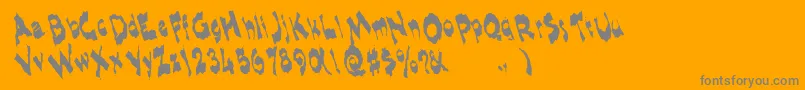 Shlophappyremix-fontti – harmaat kirjasimet oranssilla taustalla