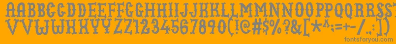 Cowboyjunkdemo-Schriftart – Graue Schriften auf orangefarbenem Hintergrund