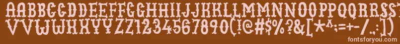 Cowboyjunkdemo Font – Pink Fonts on Brown Background