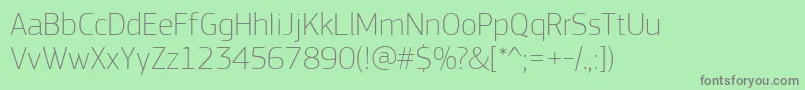 Czcionka PfsquaresansproThin – szare czcionki na zielonym tle