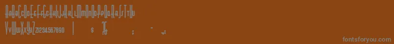 NickodemusExtremus Font – Gray Fonts on Brown Background