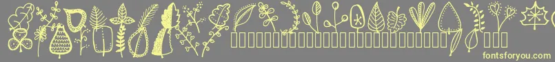 Tanaesteldoodleleaves01Regular Font – Yellow Fonts on Gray Background