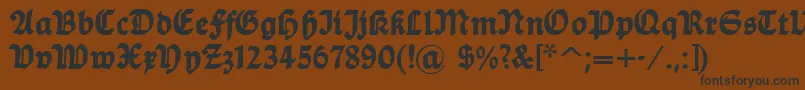 Dsballade Font – Black Fonts on Brown Background