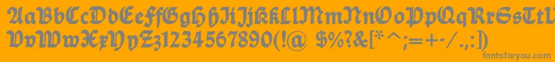 フォントDsballade – オレンジの背景に灰色の文字