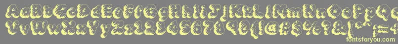 Mcklt-Schriftart – Gelbe Schriften auf grauem Hintergrund