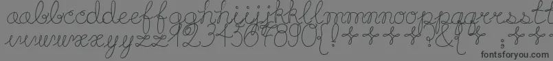 Playdate-Schriftart – Schwarze Schriften auf grauem Hintergrund