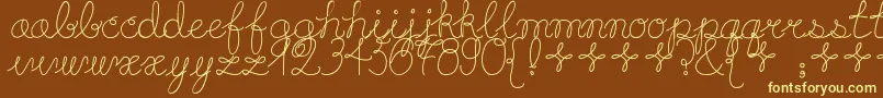 Шрифт Playdate – жёлтые шрифты на коричневом фоне