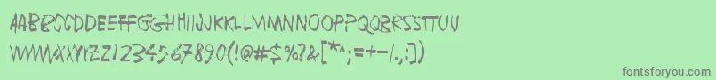 フォントFugaDeCerebros – 緑の背景に灰色の文字