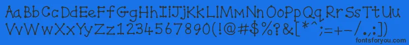 Spottydottie Font – Black Fonts on Blue Background