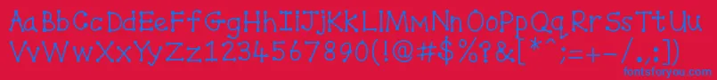 Spottydottie-Schriftart – Blaue Schriften auf rotem Hintergrund