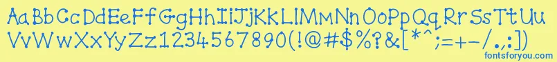 Spottydottie-Schriftart – Blaue Schriften auf gelbem Hintergrund